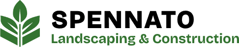 A green logo featuring three stylized leaves beside the text "Landscaping & Construction" in bold green letters, representing expertise in landscape design and masonry, on a transparent background.